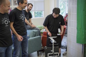 Bernard plays a customer and uses the self-checkout feature to buy a power-strip after the robot offers to help him buy it without having to go to the counter.